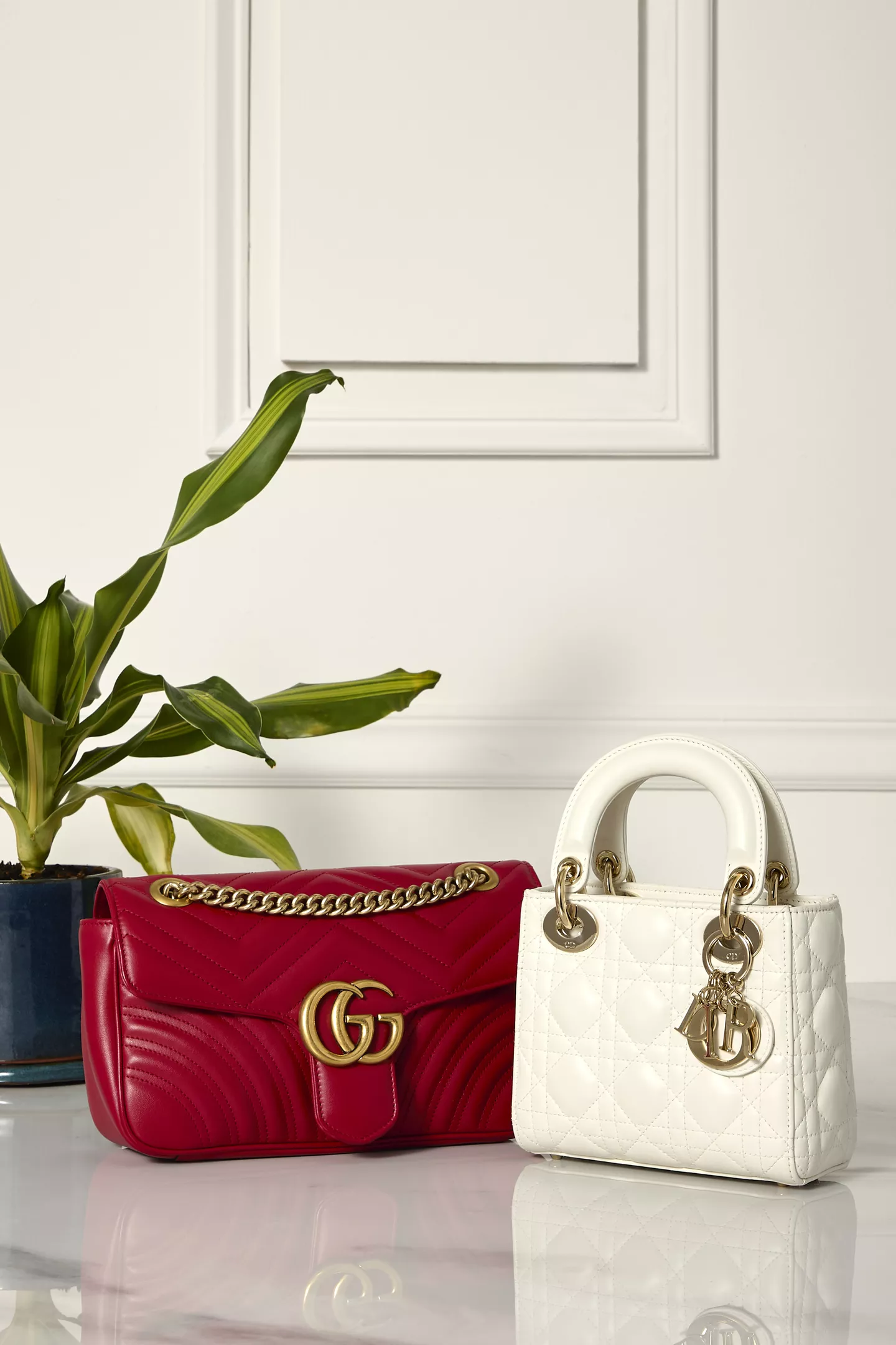 Gucci red leather Marmont shoulder bag and a White Lady Dior Small top handle