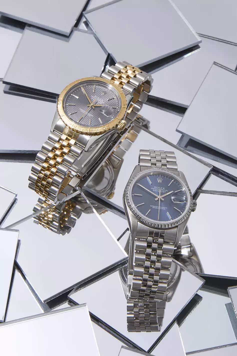 Shop by Brand: Rolex Two-Tone Graphite Dial Datejust with a Rolex Blue Dial Silver Datejust