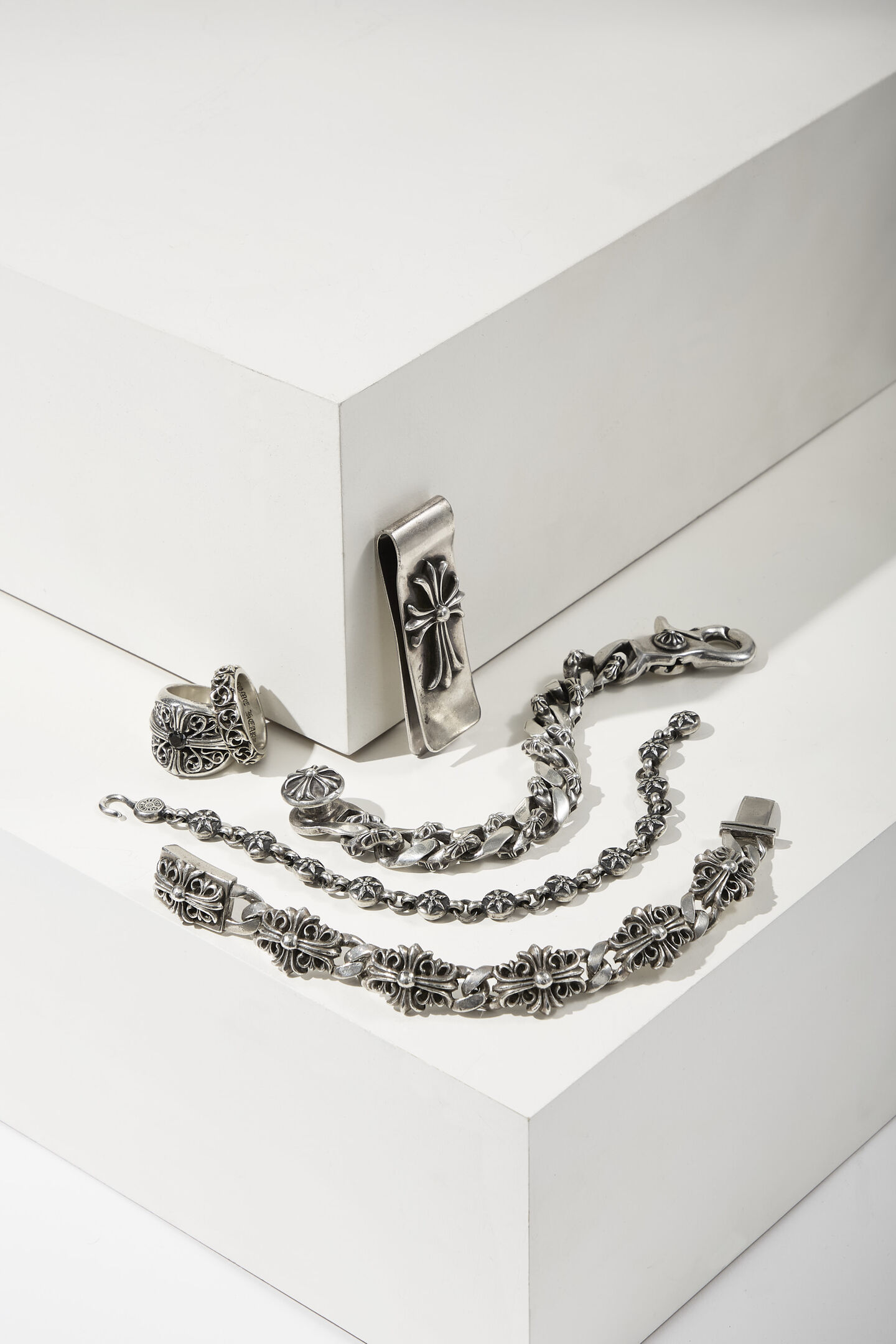 Chrome Hearts silver bracelets laid out