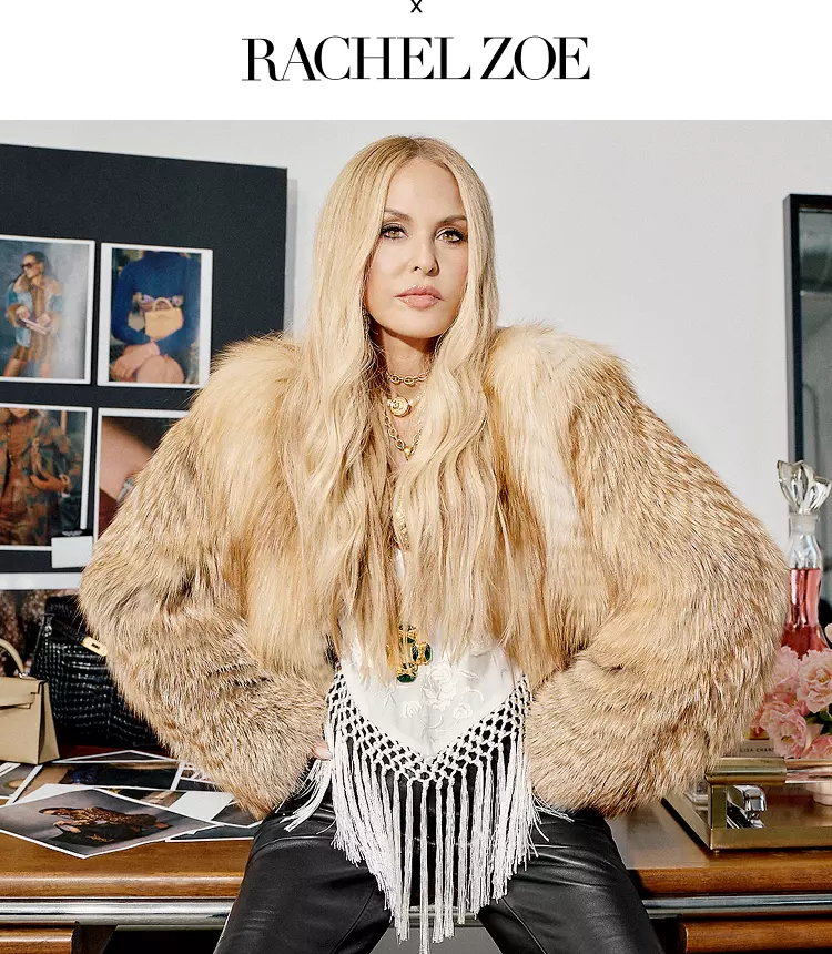 Hero Banner: Rachel Zoe posing in a fur coat in front of an office desk.