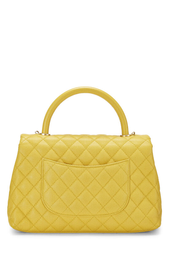 Luxury Promise on Instagram: “Here's to our Sunday special, the most  beautiful Chanel Coco top handle bag in yellow 💛 Featuring a rigid top  handle and an addit…