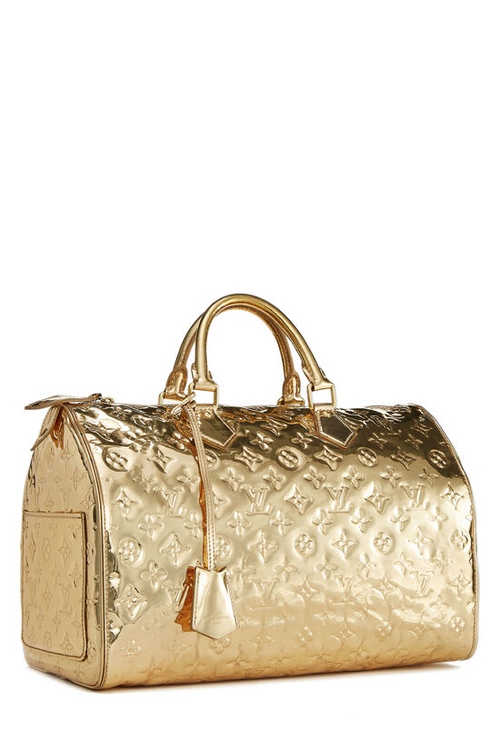 Louis Vuitton Speedy 35 handbag(Gold)