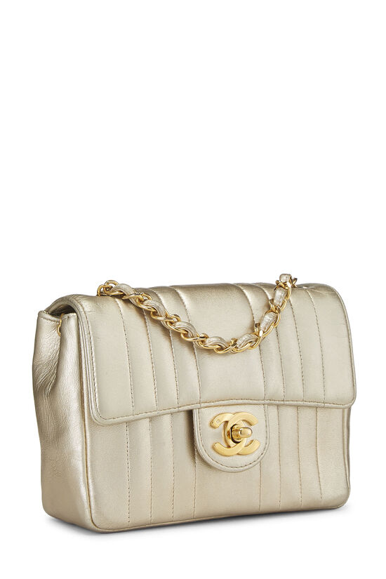 CHANEL MINI QUILTED FLAP GOLD