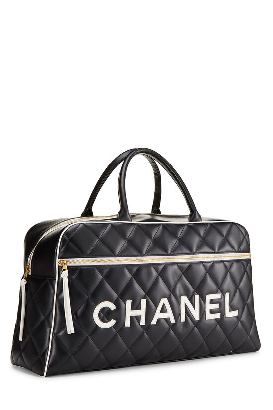 CHANEL BOWLING HANDBAG, black quilted leather with two main