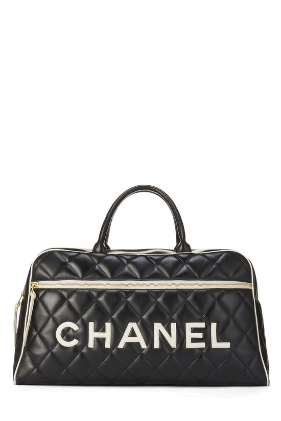 CHANEL BOWLING HANDBAG, black quilted leather with two main