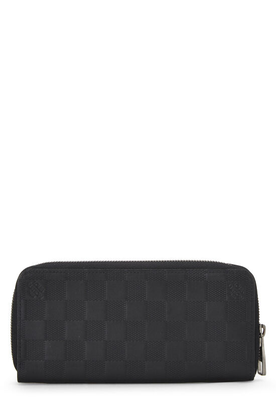 Pre-Owned Black Damier Infini Zippy Vertical Wallet QJACBDBFKB004