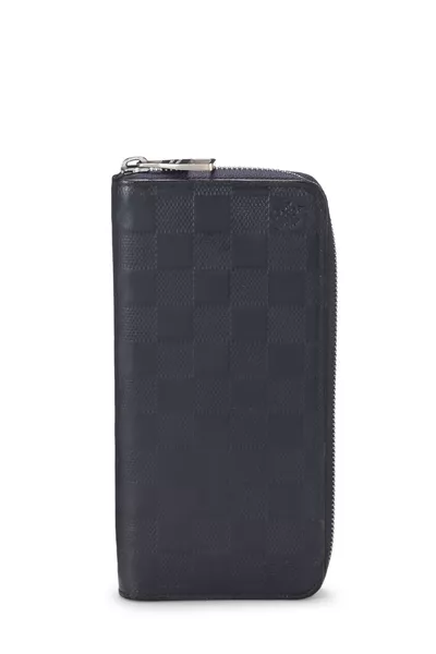 Navy Damier Infini Zippy Vertical Wallet