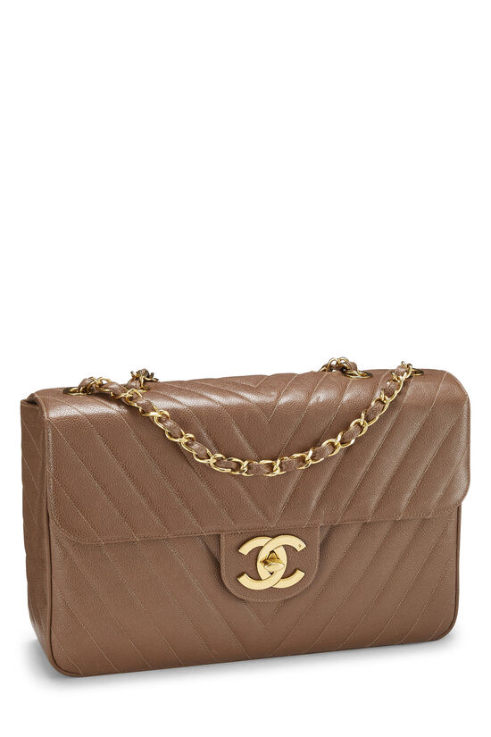 A BLACK LAMBSKIN LEATHER MAXI SINGLE FLAP BAG WITH GOLD HARDWARE, CHANEL,  1991-1994