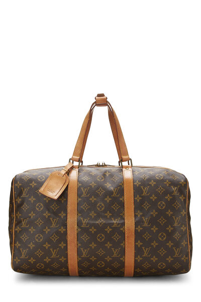 Louis Vuitton - Navy Monogram Mini Canvas Josephine PM - Is there any way  to remove the pinkish color?
